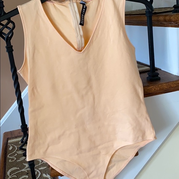 Peach leotard. Tie around neck. Size medium - Picture 2 of 4
